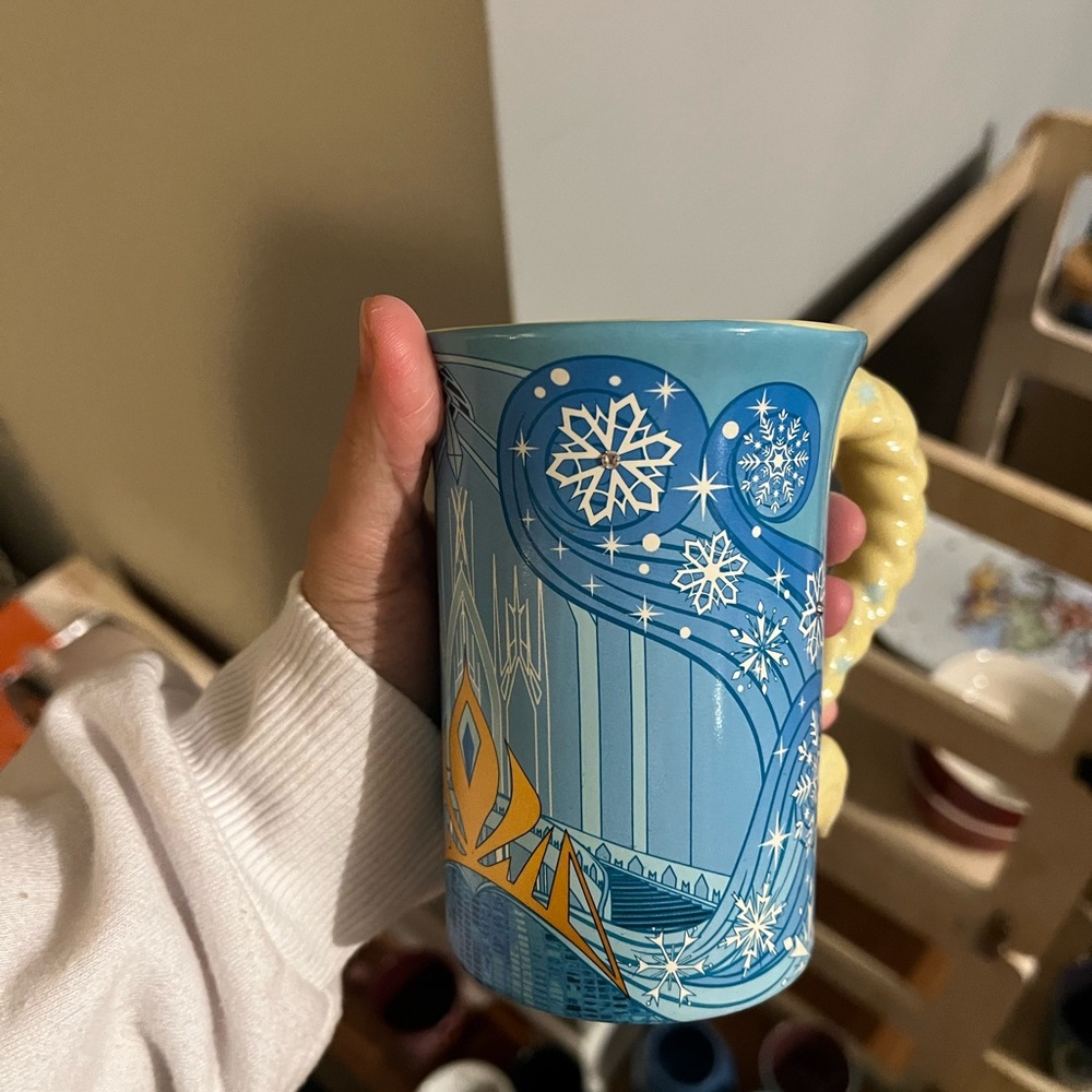 Disney Blue Mug with Yellow Handle and Snowflakes